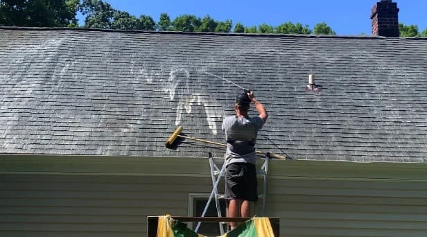 Before and after results of roof washing by Mentor Power Washing in Mentor